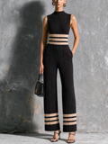 Mono Chic Elegante Negro con Cuello Alto, Ribete en Contraste, sin Mangas y Pierna Ancha