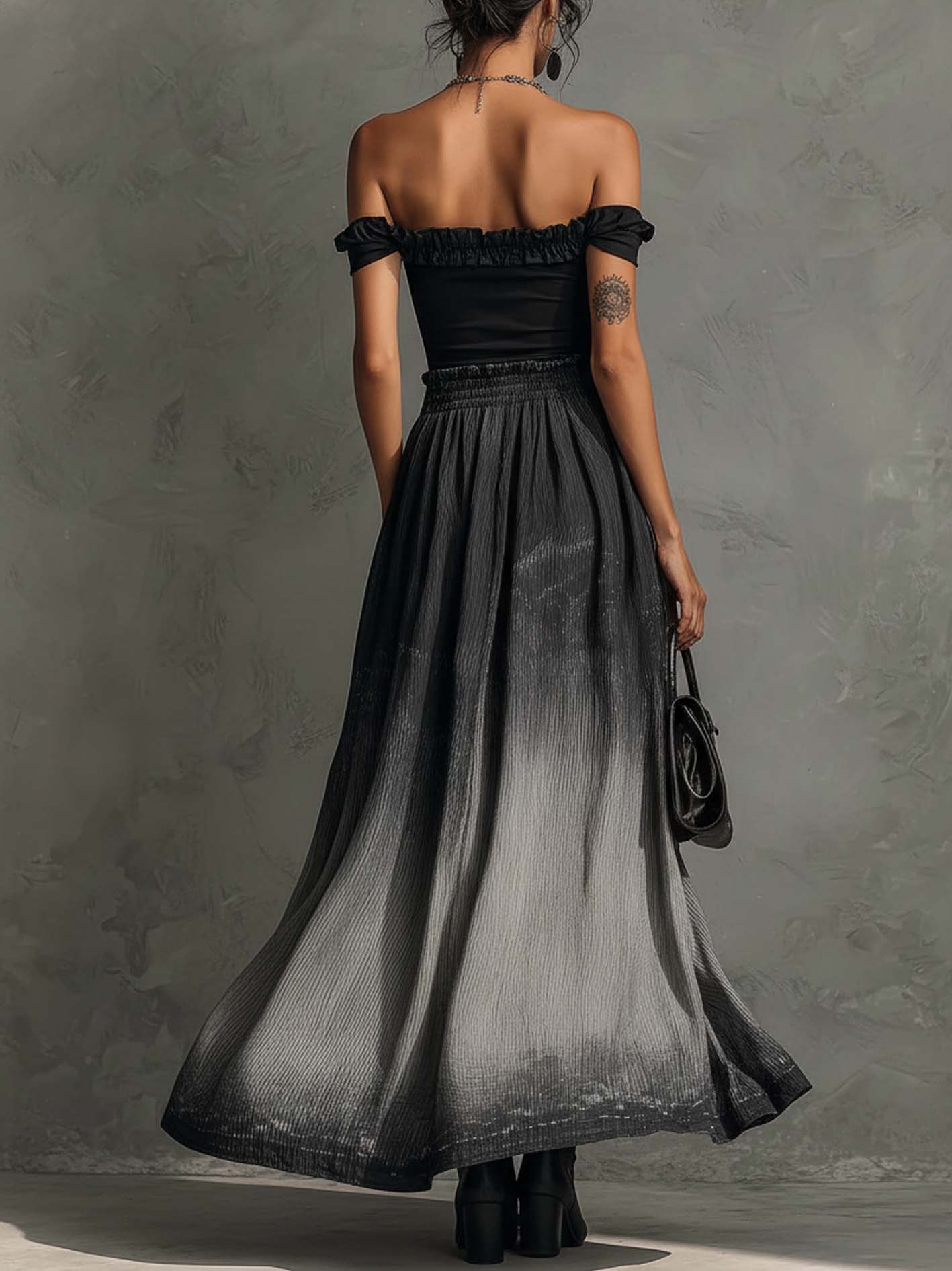 Conjunto de Top Negro Off-Shoulder con Volantes y Falda Maxi Plisada en Degradé