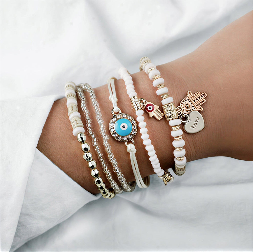 Set de Pulseras Doradas con Hamsa