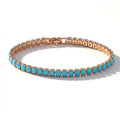 Pulsera Elegante de Cadena Dorada con Turquesa
